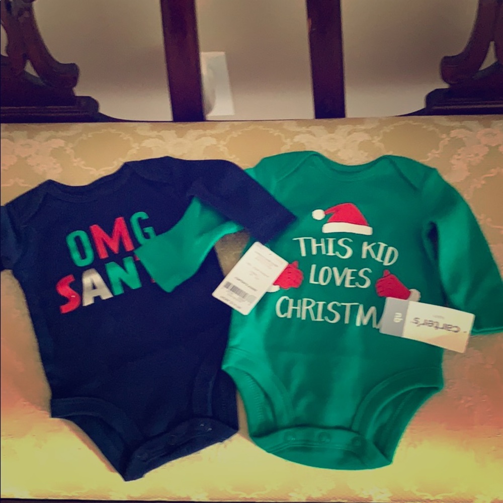 Newborn onesies.  Long sleeved.  Christmas time.